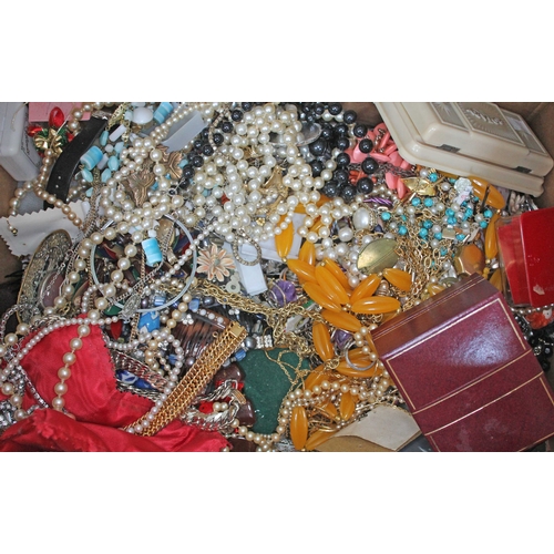 211 - A box of various costume jewellery.