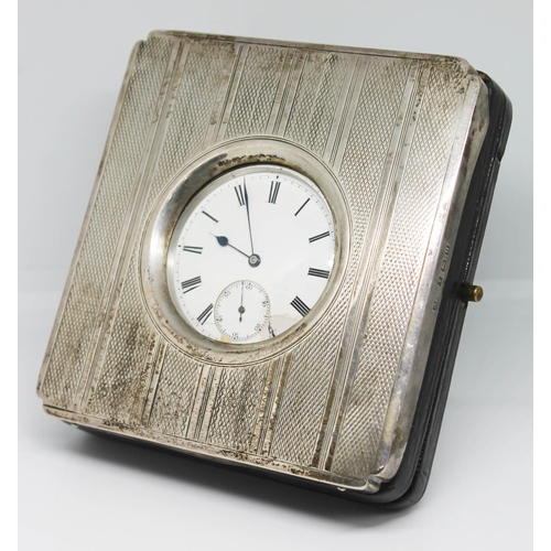 237 - A hallmarked silver pocket watch within hallmarked silver stand.