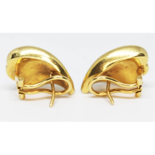 239 - A pair of 18ct gold and diamond set earrings, marked '750', gross wt. 13.8g, length 21mm each.