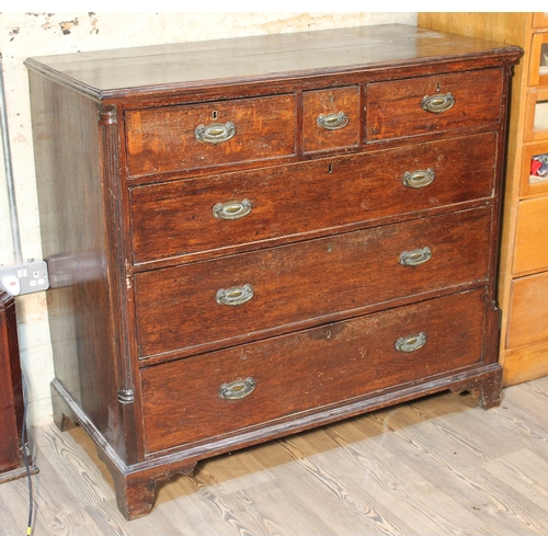 65 - A George III oak chest of drawers with quarter columns and bracket feet, width 120cm, depth 57cm & h... 