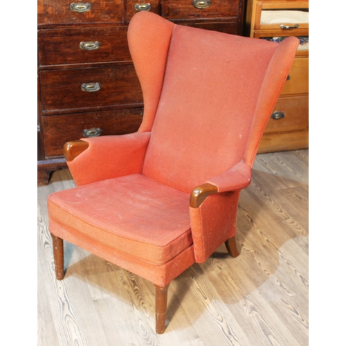 67 - A retro Parker Knoll armchair with wing back and show wood arms, width 77cm, depth 92cm & height 98c... 