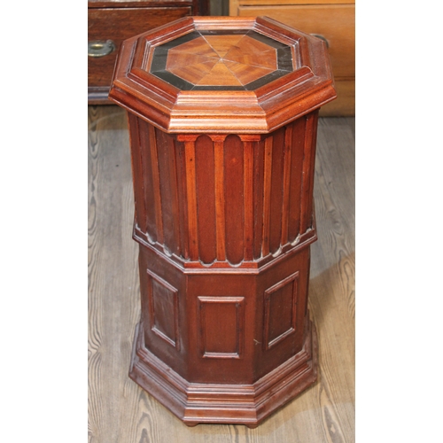 76 - An octagonal plinth circa 1900 with parquetry inlaid top, height 75cm.