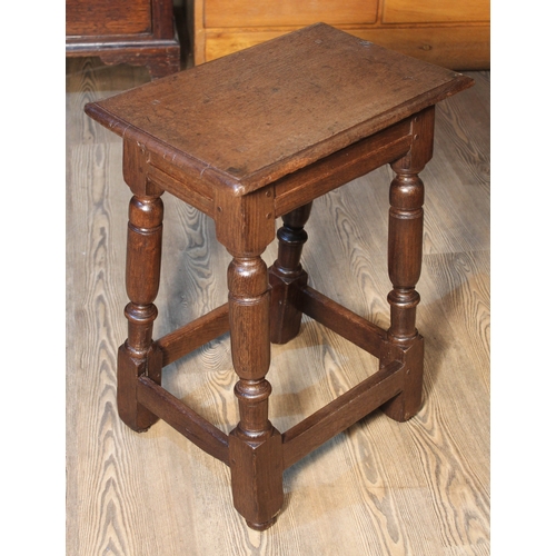 78 - An 18th century oak joint stool, height 57cm.