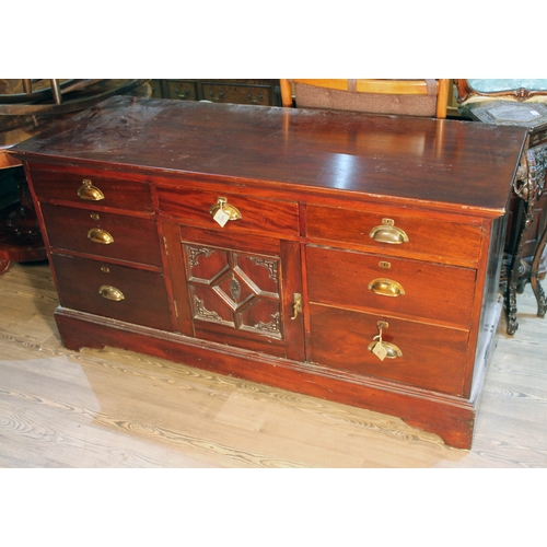 81 - A large chest of Edwardian shop type drawers with gilt brass cup handles, length 157cm, depth 53cm &... 