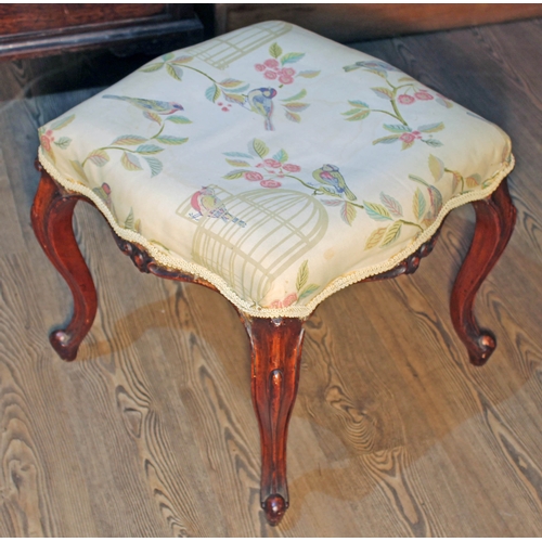 83 - A Victorian foot stool with needlework top.