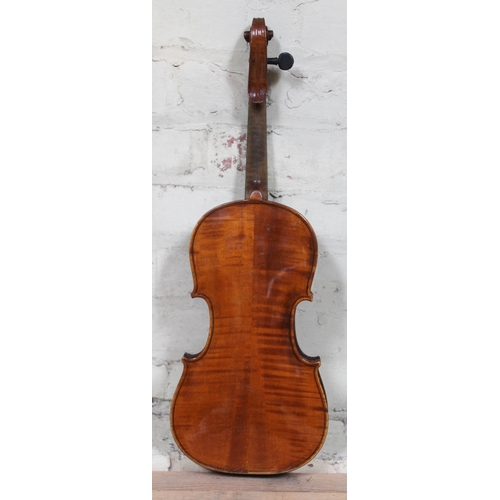 99 - A 19th century violin, unmarked, length of back 37cm.