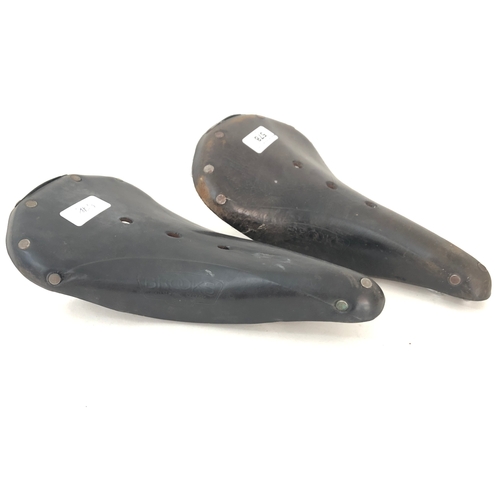 578 - Two vintage bicycle saddles comprising a Brooks Champion Standard B.17 together with a Brooks Champi... 