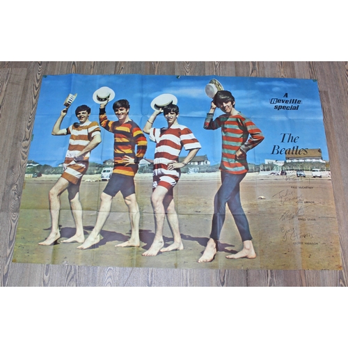 504 - A Beatles poster Reveille Special depicting The Beatles in Edwardian beach wear, 151cm x 101cm.