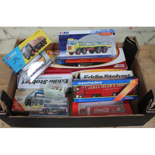 509 - A box of boxed die-cast trucks to include Corgi, Coca Cola, etc.