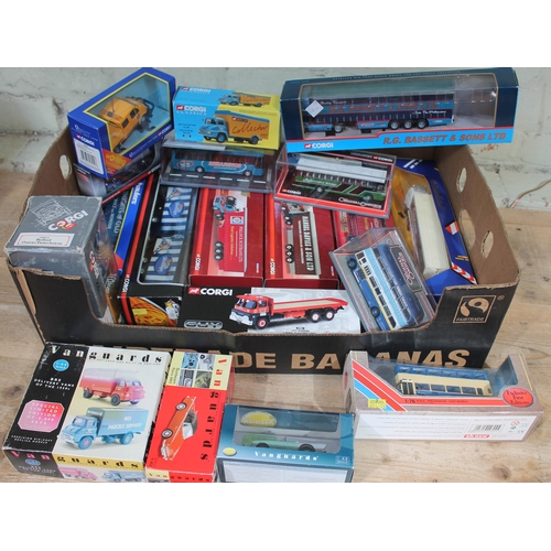 511 - A box of boxed die-cast model vehicles including 15 Corgi models, 3 Vanguards and another.