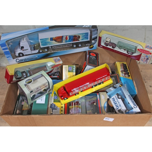 513 - A box of mainly boxed die-cast trucks and cars, various manufacturers.