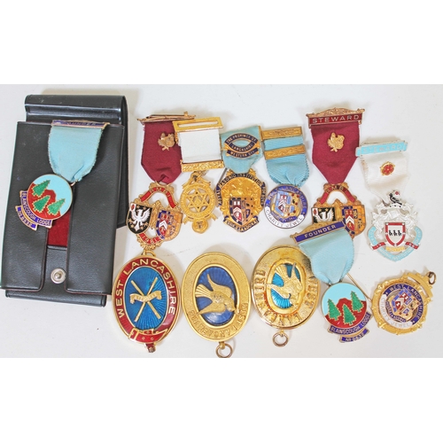 517 - Six cases of Masonic regalia including two hallmarked silver jewel and ten others.