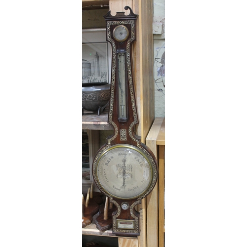 547 - A Regency inlaid rosewood barometer, length 109cm.