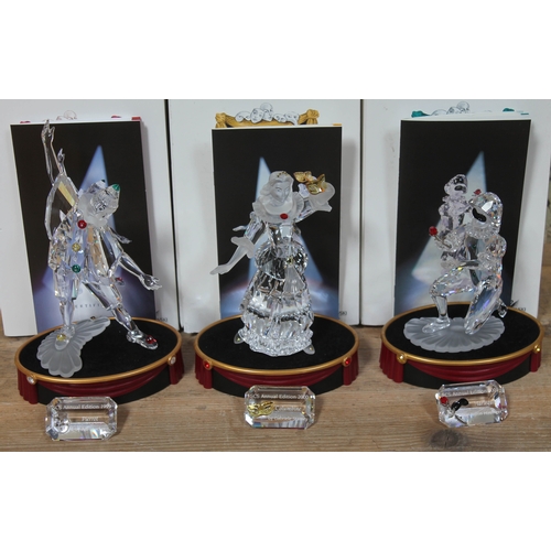 563 - A group of three Swarovski Masquerade figures comprising Harlequin, Columbine & Pierrot, boxed with ... 