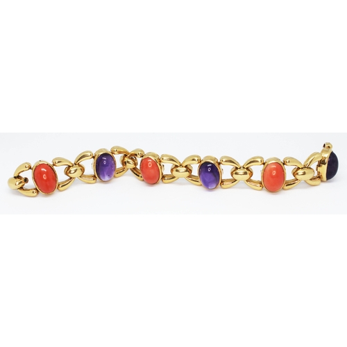 104 - CARTIER
A vintage coral and amethyst cabochon bracelet crafted in 18ct yellow gold circa 1970s, each...