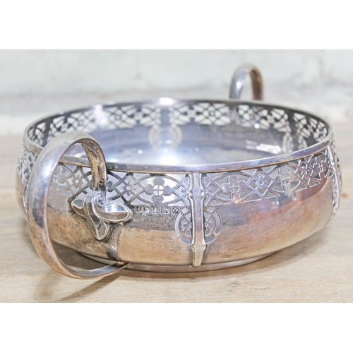 140 - An Arts & Crafts twin handled silver bowl with pierced border, Edward Souter Barnsley, Birmingham 19... 