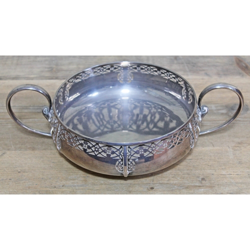 140 - An Arts & Crafts twin handled silver bowl with pierced border, Edward Souter Barnsley, Birmingham 19... 