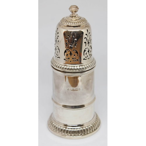 142 - A hallmarked silver sugar castor, height 13.5cm, wt. 4oz.