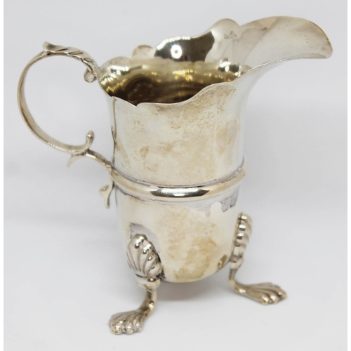 144 - A hallmarked silver cream jug, height 8.5cm, wt. 2oz.