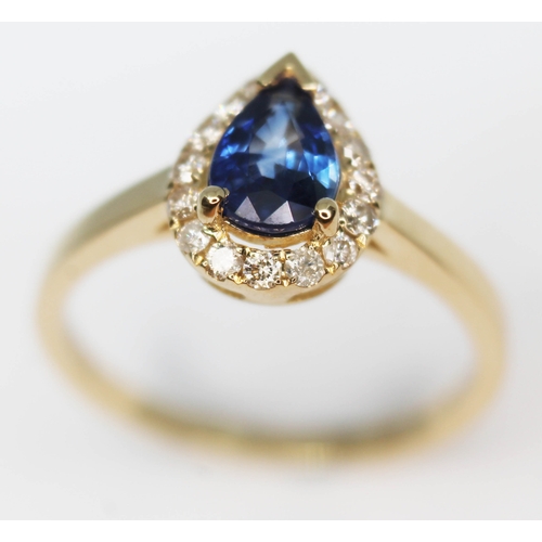 154 - A 14ct gold sapphire and diamond ring featuring a pear cut medium blue natural sapphire approx. 0.71... 