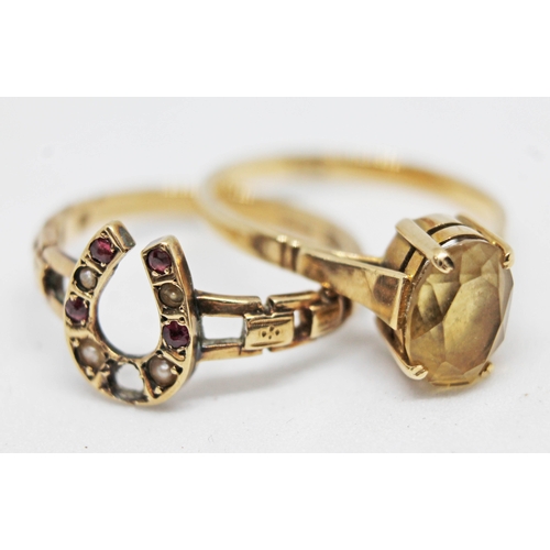 282 - Two 9ct gold rings, one formed as a horse shoe and the other set with a yellow stone, both marked '9... 