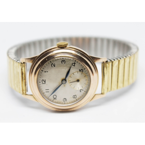 291 - A 1940s 9ct gold unisex manual wind wristwatch, case diam. 28mm, on flexi strap.