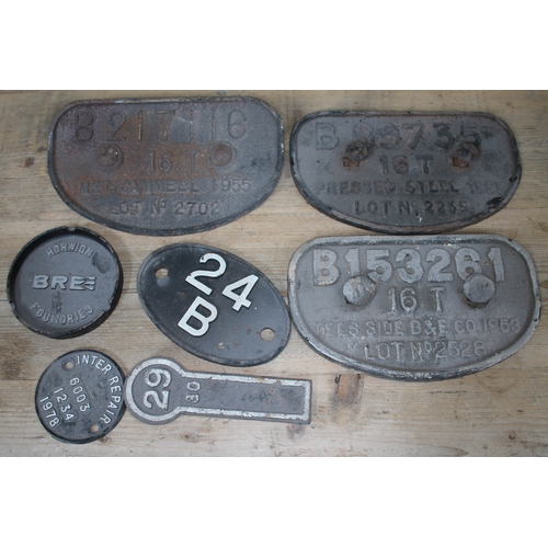 365 - Three wagon plates, a shedplate 24B and three other cast iron plaques.