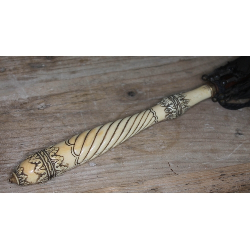 398 - A Victorian parasol with carved ivory handle and yellow metal collar.