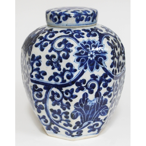 402 - A Chinese porcelain ginger jar and cover of octagonal form and decorated in blue white with lotus fl... 