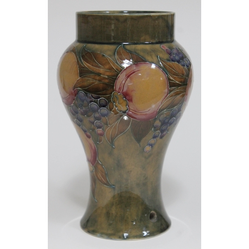 405 - A Moorcroft pomegranate pottery vase made for Liberty & Co, painted and impressed marks, dated 1911,... 