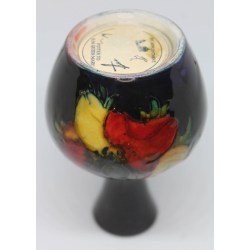 410 - A Moorcroft pottery vase, height 9cm.