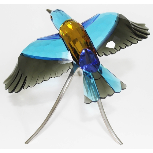 441 - A Swarovski Paradise Birds roller bird on metal stand, height 17cm.