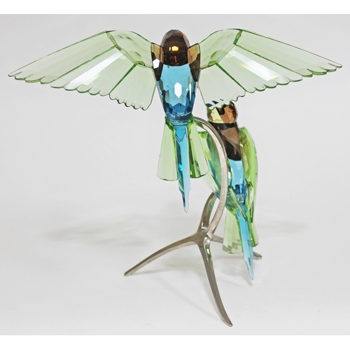 442 - A Swarovski Paradise Birds bee eaters on metal stand, height 29cm.