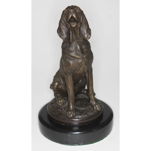 482 - After Mene, bronze figure depicting a seated dog, bearing signature, on black marble base, height 26... 