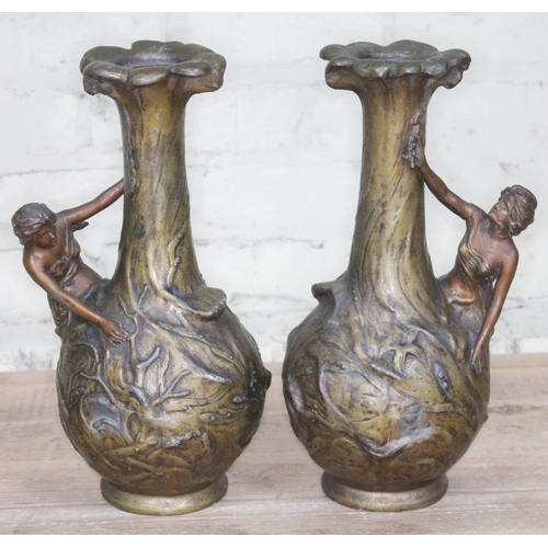 484 - A pair of Art Nouveau style spelter vase, signed 'J Garvier', height 38cm.