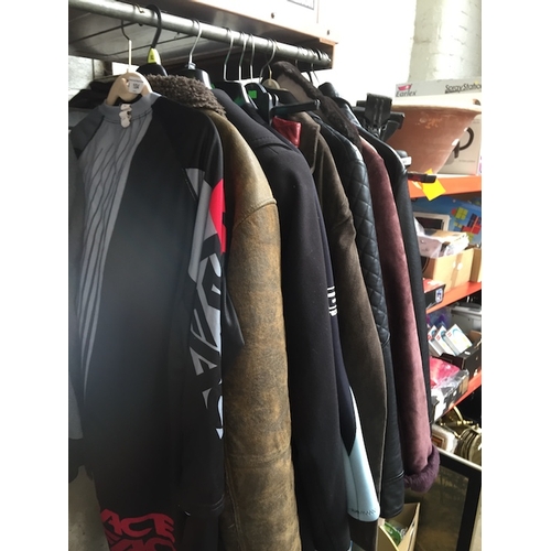 104 - A collection of 12 various clothing items to include jackets, leather jackets, River Island aviator ... 