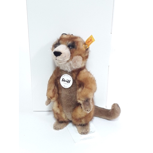 524 - A Steiff meerkat Rico with ear tag numbered 064425, labels and box.