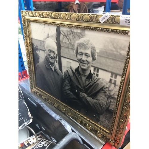 22 - A  photograph of Sir Tom Finney together with Tom Benson (The Marathon Man), signed on verso