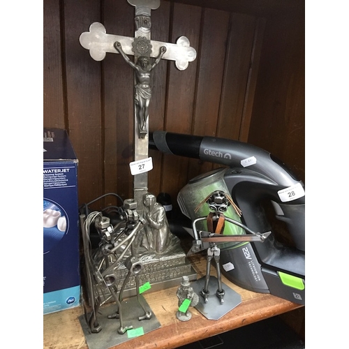 27 - A white metal crucifix with triple layer base and 3 metal models.