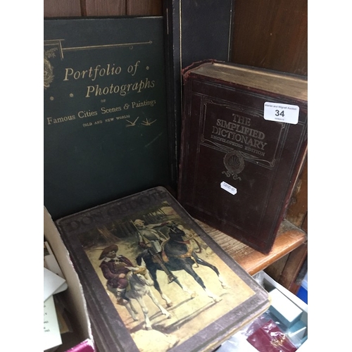 34 - A collection of books and a portfolio of photographs including Don Quixote, etc