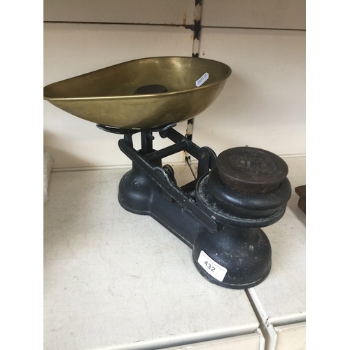 432 - A set of weighing scales with brass pan and weights