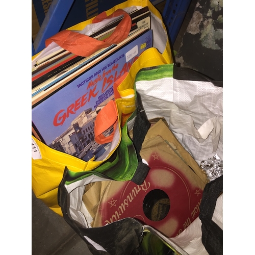 111 - 2 bags of misc LPs and old records.