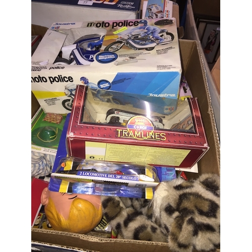 79 - A box of games and toys to include Corgi, National Geographic, Joustra, dolls, etc.