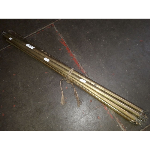 103 - A bundle of brass stair rods