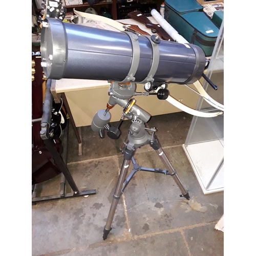 79 - A Celestron Astro Master 130 on extendable tripod