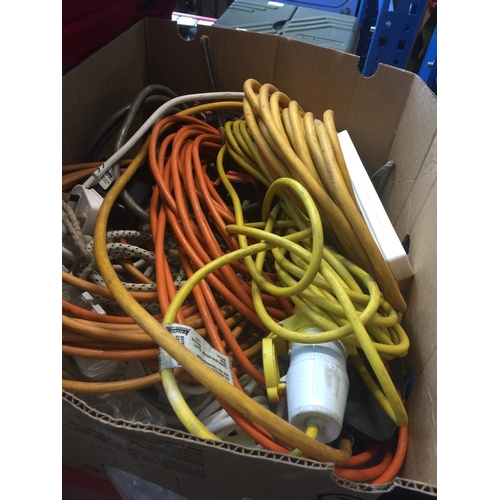 347 - A box of cables and extension leads.