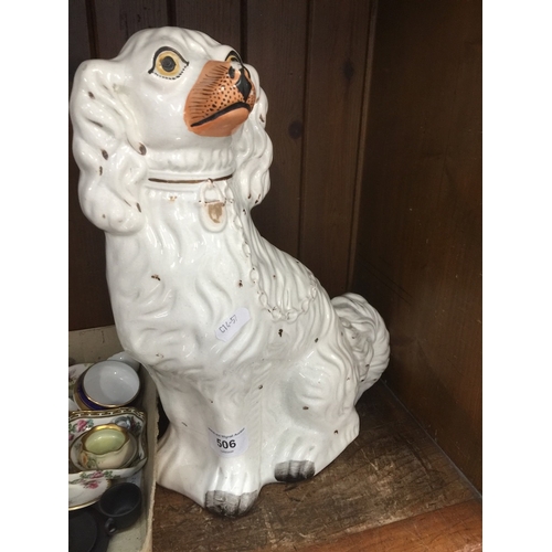 506 - A Staffordshire pot dog.