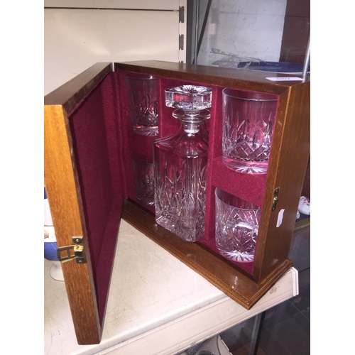 657 - Decanter and 4 whisky glasses in wooden case