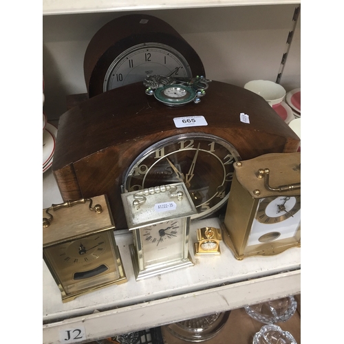 665 - Collection of clocks to include mantel clocks, Smiths, carriage clocks, etc.