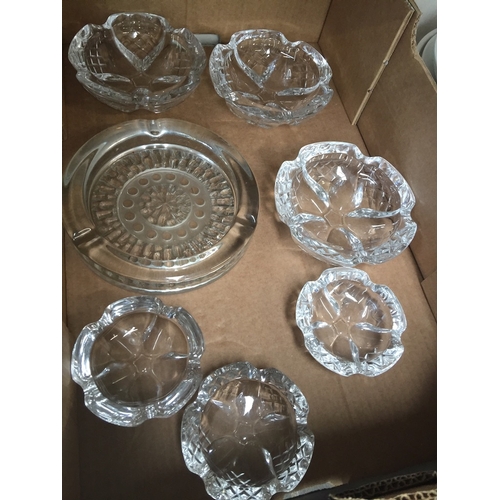 670 - 6 matching heavy glass ashtrays and one other